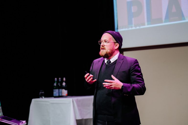 A speaker on stage
